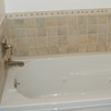 tub with tile around it